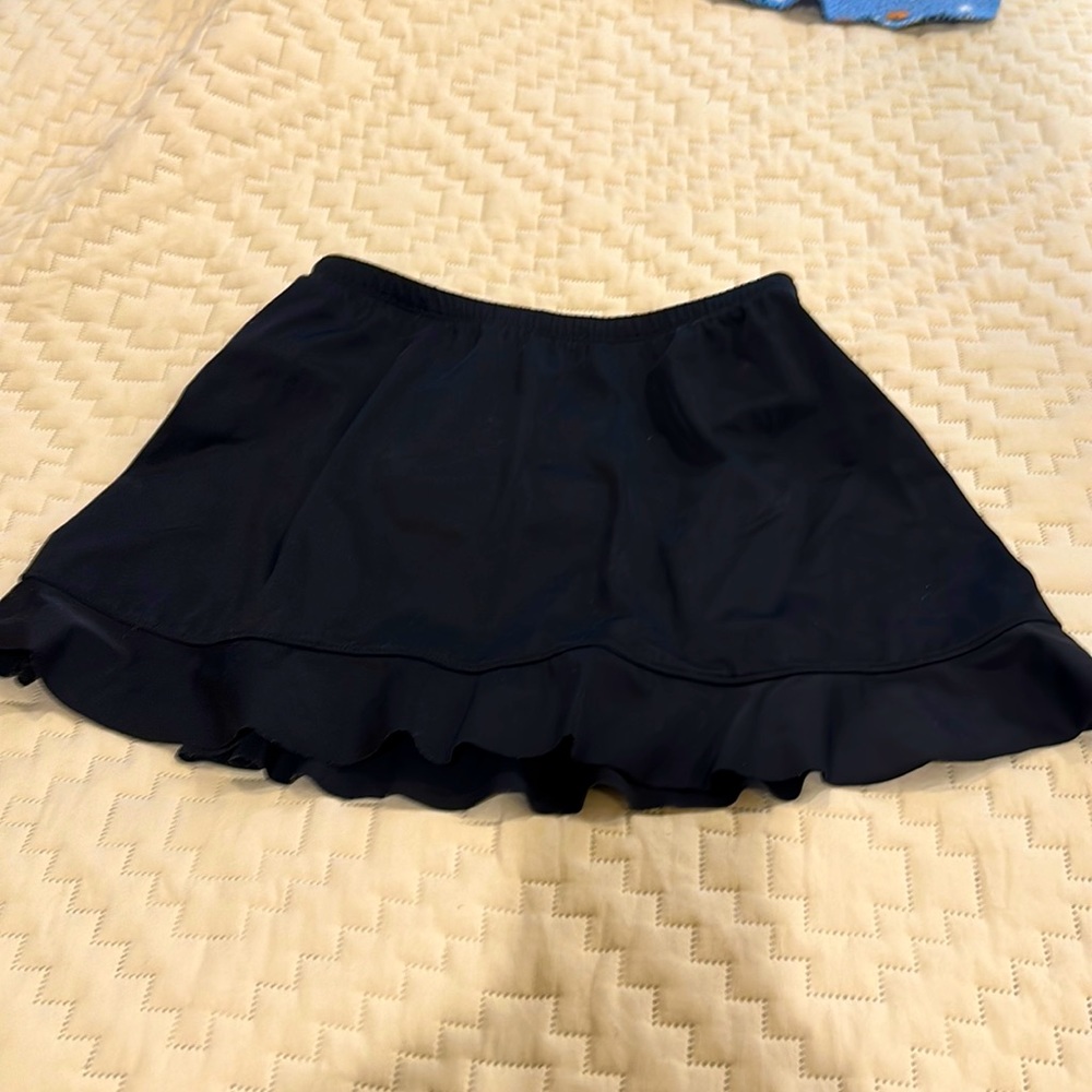 NWOT St Johns bay black swim or athletic skort. Size 10.